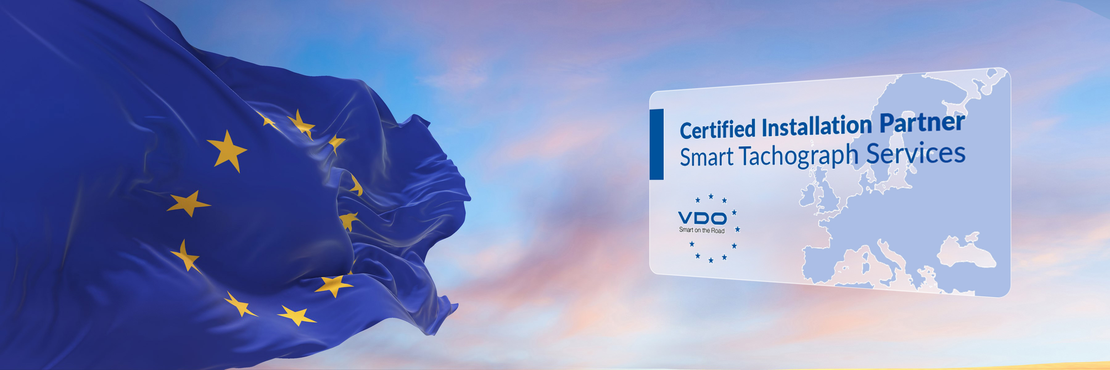 The left half of the picture shows a fluttering EU flag against an evening sky. A composition shows a check card with the inscription “Certified Installation Partner - Smart Tachograph Services”. The blue VDO logo and a map of the EU can also be seen.