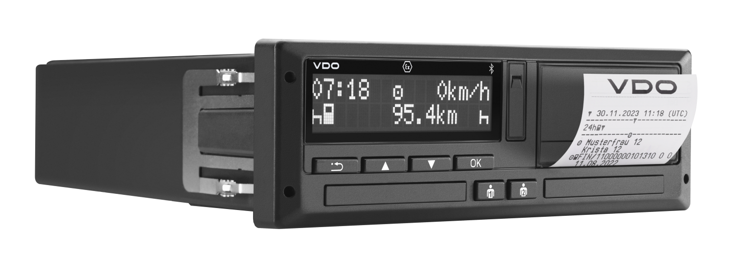The VDO DTCO 4.1a tachograph including a data printout depicted from a side angle. 
